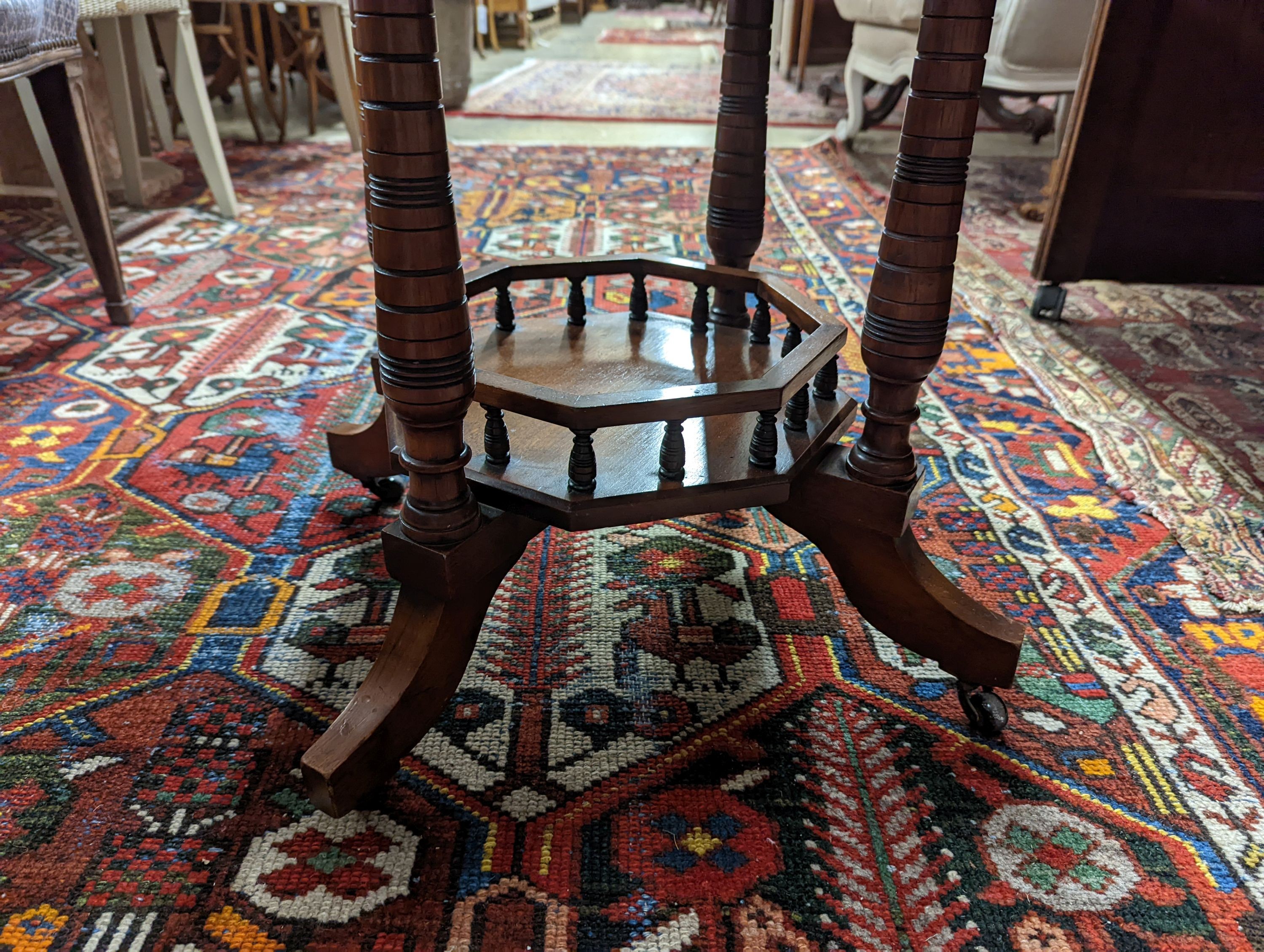 A late Victorian walnut octagonal centre table, width 70cm, height 66cm